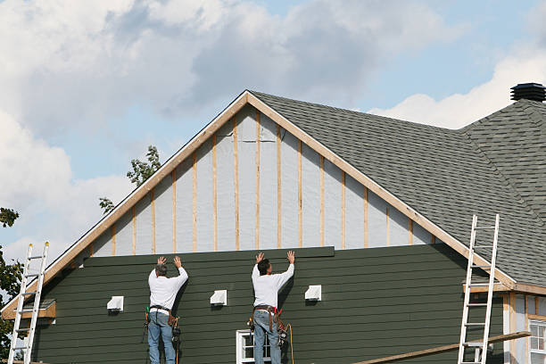 Professional Siding Replacement technician working in Durham, CT